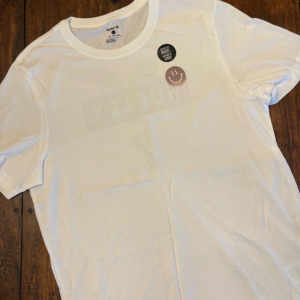 Hurley HOT MESS GUSHER SS
GRAPHIC TEE size large have a nice day smiley face NWT